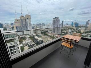 High-rise apartment balcony with city view