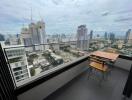 High-rise apartment balcony with city view