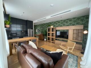 Modern living room with open kitchen