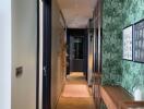 Modern hallway with wooden floor and tropical wallpaper