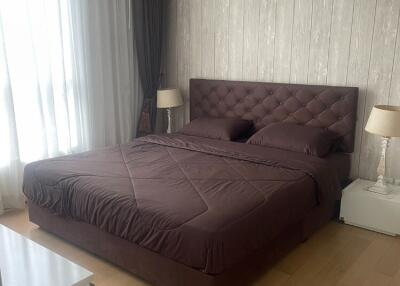 Modern bedroom with double bed and side tables