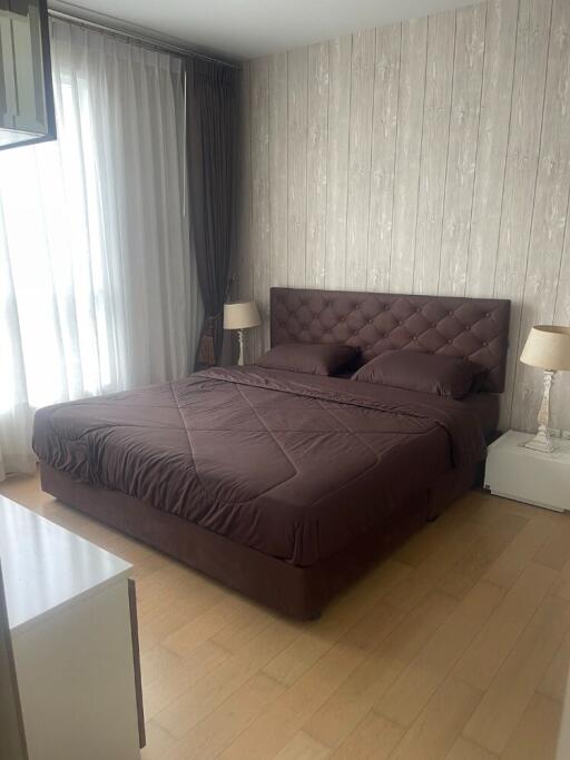 Modern bedroom with double bed and side tables