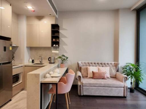 Modern living area connected to kitchen