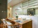 A modern kitchen with dining area