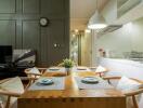 Dining area with a wooden table and stylish chairs