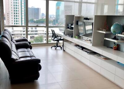 Modern living room with panoramic windows and city view