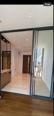 Modern entryway with glass sliding door