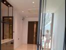 Modern entryway with glass sliding door