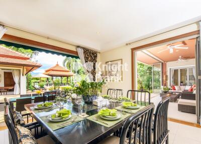 Spacious dining area with outdoor view and modern decor