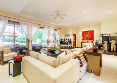 Modern and spacious living room with large windows