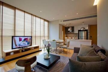 Modern living room with kitchen and dining area