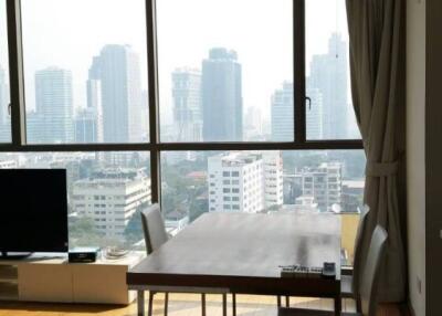 Modern dining area with a city view