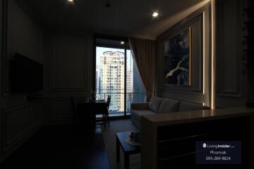 Living room with large window and balcony view