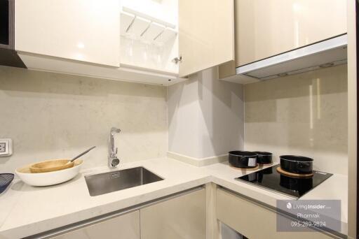 Modern kitchen with stovetop and sink