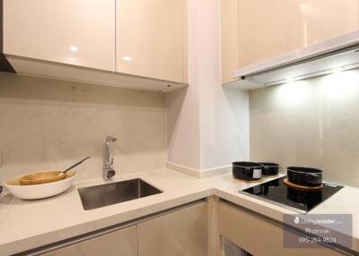 Modern kitchen with marble countertop and appliances