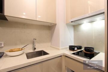 Modern kitchen with marble countertop and appliances