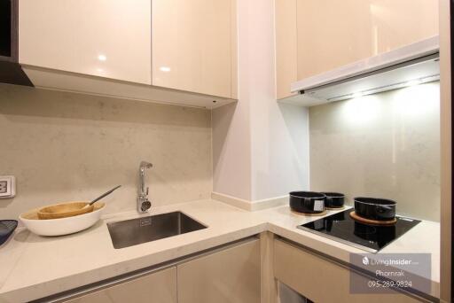 Modern kitchen with marble countertop and appliances