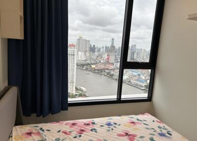 Bedroom with city and river view