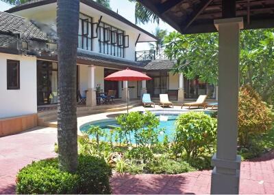 4-Bedroom Tropical Pool Villa in Oceanfront Paradise