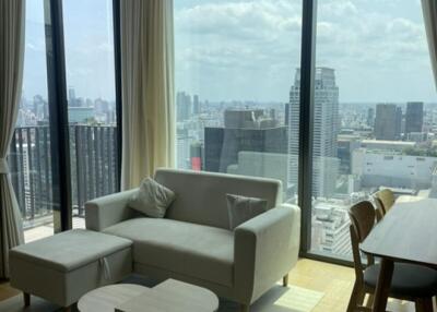 Modern living room with large windows and city view