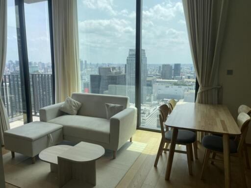 Living and dining area with panoramic city view