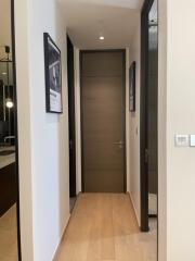 Modern hallway with wooden floor and minimalistic design