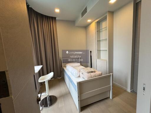 Modern bedroom with single bed and study area