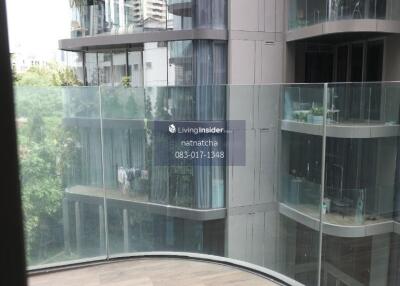 Outdoor balcony view of adjacent modern residential building