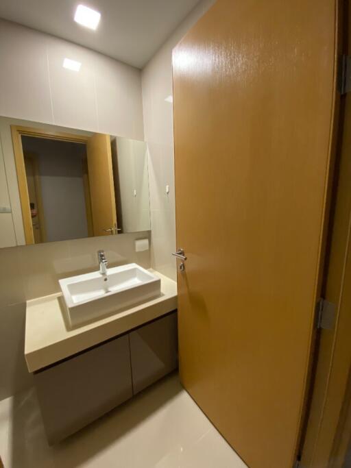 Bathroom with sink and mirror