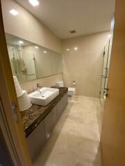 Modern bathroom with large mirror and glass shower