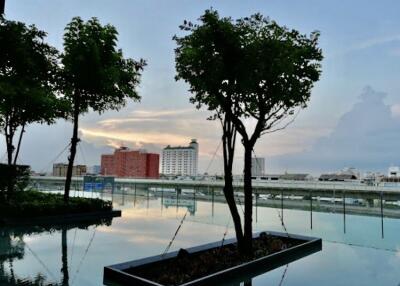 Swimming pool area with city view