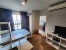 Modern bedroom with window, bed, shelves, TV, and air conditioner