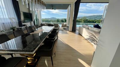 Spacious living and dining area with a view