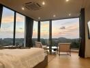 Bedroom with large windows and scenic view