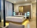 Modern bedroom with double bed and ambient lighting