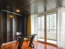 Living room with large windows and balcony view