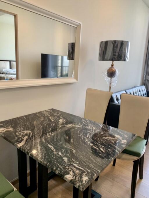 Modern dining room with marble table and stylish decor