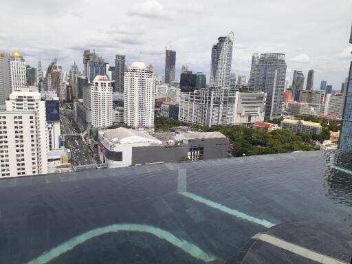 City view with buildings and infinity pool