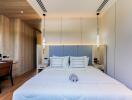 Modern bedroom with wooden accents and pendant lights