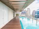 Rooftop pool area with city view