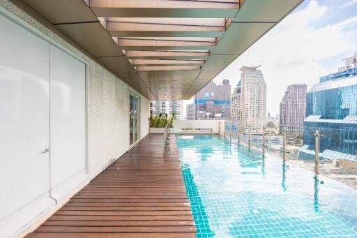 Rooftop pool area with city view