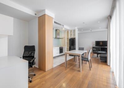 Modern living space with dining area and office corner