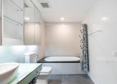 Modern bathroom with bathtub and contemporary fixtures