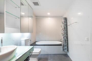 Modern bathroom with bathtub and contemporary fixtures