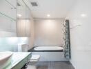 Modern bathroom with bathtub and contemporary fixtures