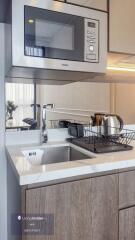 Modern kitchen area with appliances