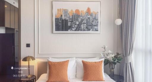 Modern bedroom with cityscape artwork