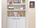 Built-in wall shelves with decor and cabinet storage 