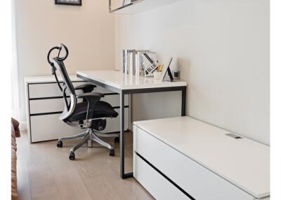 Modern home office with white furniture