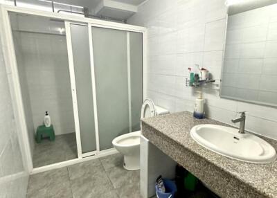 Spacious bathroom with shower and ample counter space